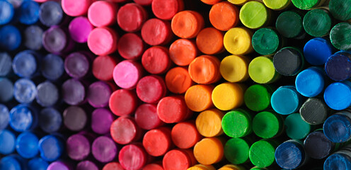 Wall Mural - Box of crayons in a rainbow of colors background