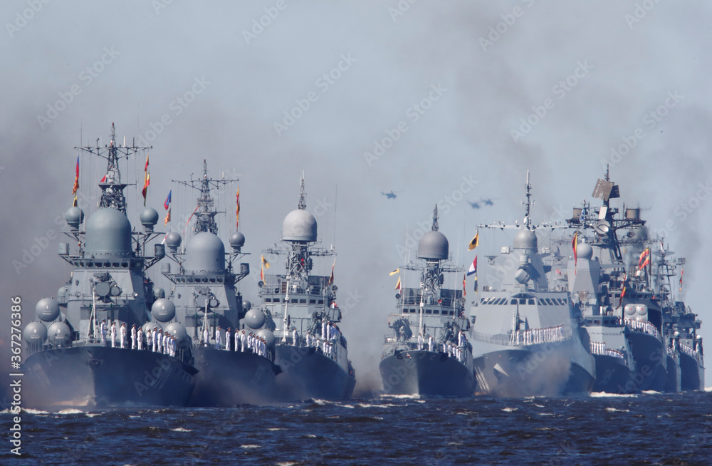 Russian warships sail during the Navy Day parade in Kronstadt
