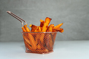 Wall Mural - Deep fried sweet potato fries.