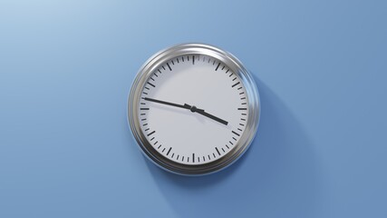 Wall Mural - Glossy chrome clock on a blue wall at forty-seven past three. Time is 03:47 or 15:47