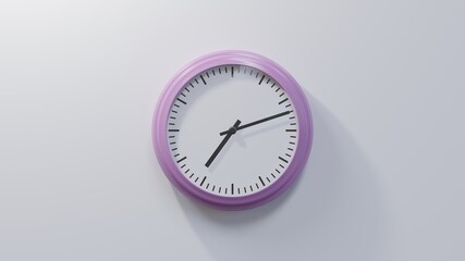 Glossy pink clock on a white wall at twelve past seven. Time is 07:12 or 19:12