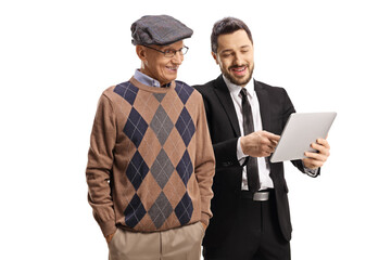 Sticker - Professional man in a black suit showing a tablet to an elderly man