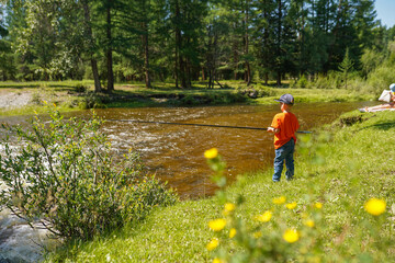 Wall Mural - boy fishing on the river