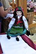 Traditional polish doll wearing folk dress
