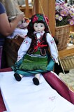 Fototapeta Storczyk - Traditional polish doll wearing folk dress