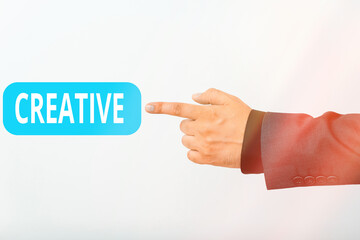 Poster - Text sign showing Creative. Business photo text managed to get around legal or conventional limits of laws Model with pointing hand finger symbolizing navigation progress growth