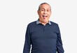 © Krakenimages.com - Senior handsome man wearing casual polo sticking tongue out happy with funny expression. emotion concept.