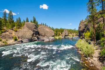 Large boulders and river rapids at the Bowl and Pitcher area of Riverside State Park in Spokane Washington, USA