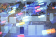 © peshkova - Double exposure of data theme drawing hologram over topview work table background with computer. Concept of technology.