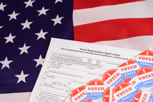 Voter Registration Application For The 2020 Presidential Elections, On An American Flag Background.