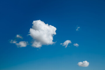 Wall Mural - white, fluffy clouds in blue sky. background from clouds