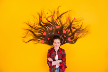 Sticker - Top view above high angle flat lay flatlay lie concept of nice attractive cheerful long-haired girl folded arms many hearts in curls isolated on bright vivid shine vibrant yellow color background