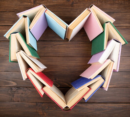 Heart shape stacked of books - love to wisdom, science and education concept