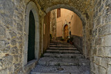 Fototapeta  - A narrow street in the old buildings of San Donato Val di Comino, a medieval village in the Lazio region.