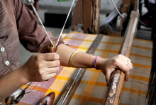 Handloom Weaver In India Working In Her Loom
