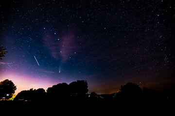 beautiful starry night with the neowise comet in the bavarian forest and the big dipper