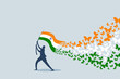 Butterflies flying from the Indian tricolour flag hoisted by a person. An Indian Independence Day concept
