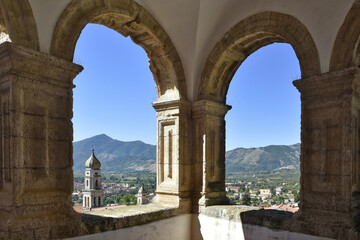 Masonry arches on a panoramic terrace overlooking the old town of Venafro, Italy.