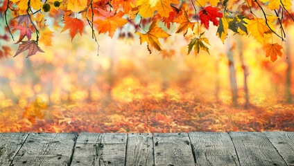 Wall Mural - Wooden table with orange leaves autumn background