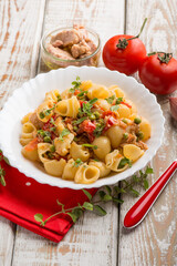 Wall Mural - pasta with tuna green peas and fresh tomatoes