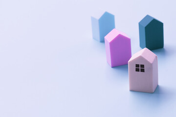 Wall Mural - House model on color background. Real estate, buying a house, new home, house concept copy space