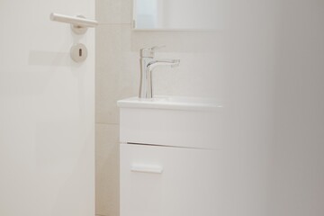 Canvas Print - Selective focus shot of a bathroom faucet