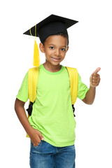 Wall Mural - Young African American school boy in graduation cap with backpack on white background