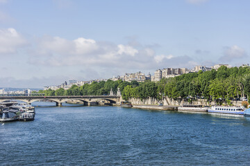 View of Jena Bridge (Pont d'Iena, 1814). Jena Bridge spanning River Seine in Paris, it links Eiffel Tower on the Left Bank to the district of Trocadero on the Right Bank. Paris, France.