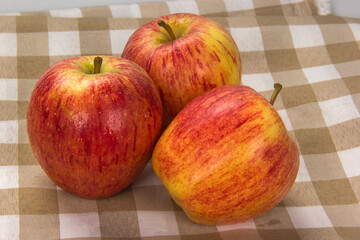 Apple selected on checkered background.