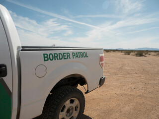 a border patrol truck parked in the desert