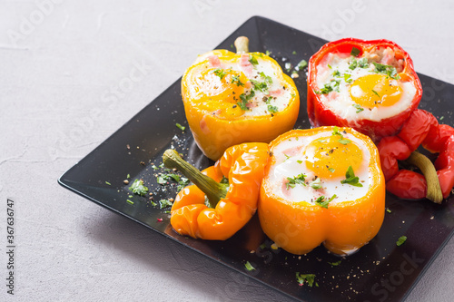 Cuadros en Lienzo Baked pepper stuffed with bacon and eggs