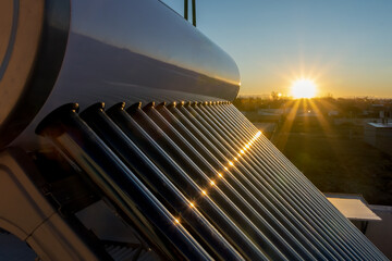 solar hot water tank at sunset
