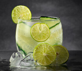 Lemonade, refreshing lemon drink with cucumber and ice