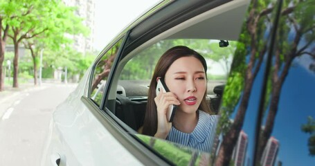 Wall Mural - businesswoman speak phone in car