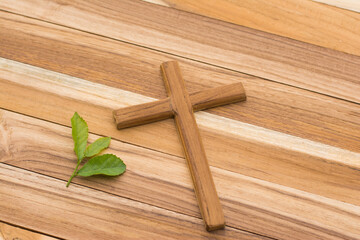 Wall Mural - Wood cross or religion symbol shape over wood  background for God.