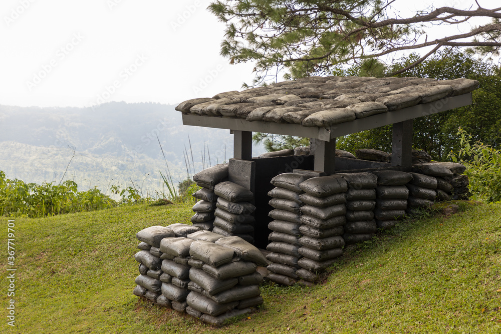Sandbag bunker of the old military bunker base on the mountain. Old bunker war make of sandbag for the military on the mountain. Stock Photo | Adobe Stock