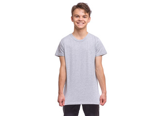 Wall Mural - T-shirt design concept. Teen boy in blank gray t-shirt, isolated on white background. Mock up template for print. Happy child looking at camera, front view.