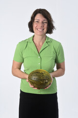 woman with cantaloupe on white background