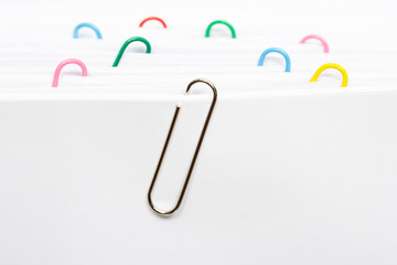 paper clip on white paper
