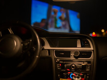 Car Interior In A Drive-in Watching A Movie

