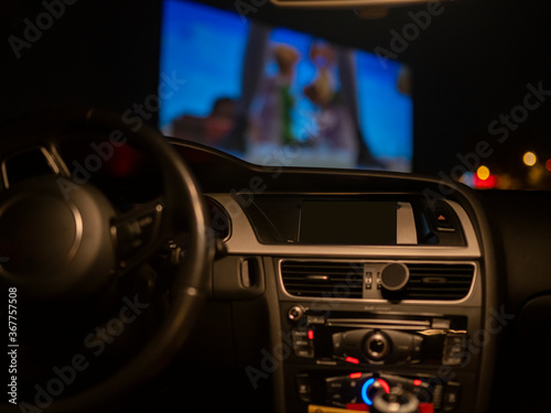 Cuadros en Lienzo car interior in a drive-in watching a movie