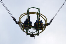 Two People On The Bungee Ride Bottom View.