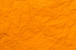 crumpled orange paper for orange background