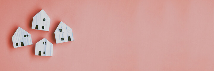 Wall Mural - House model on color background. Real estate, buying a house, new home, house concept banner