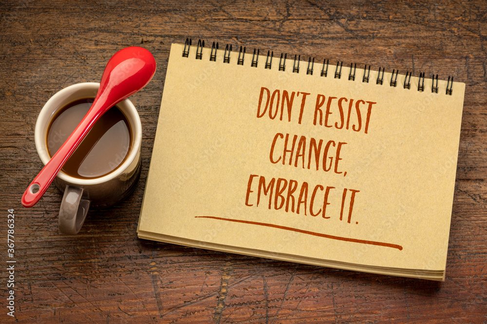 do not resist change, embrace it - motivational phrase in a spiral sketchbook with a cup of coffee, business, education and personal development concept - obrazy, fototapety, plakaty 