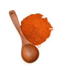 Paprika ground and wooden spoon on white background. Used to color rices, stews, and soups, meats.