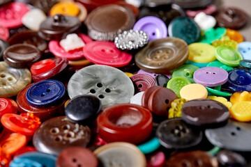 Poster - Background and texture of multicolored antique buttons