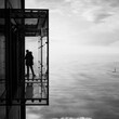 © el9th - silhouette of a man in a glass observatory