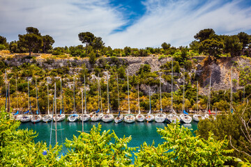 Wall Mural - The sailing yachts on the azure water