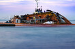 Twilight long exposure of wrecked ship in Odessa Ukraine.